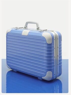 RIMOWA Limited Edition Holiday Case in Light Blue